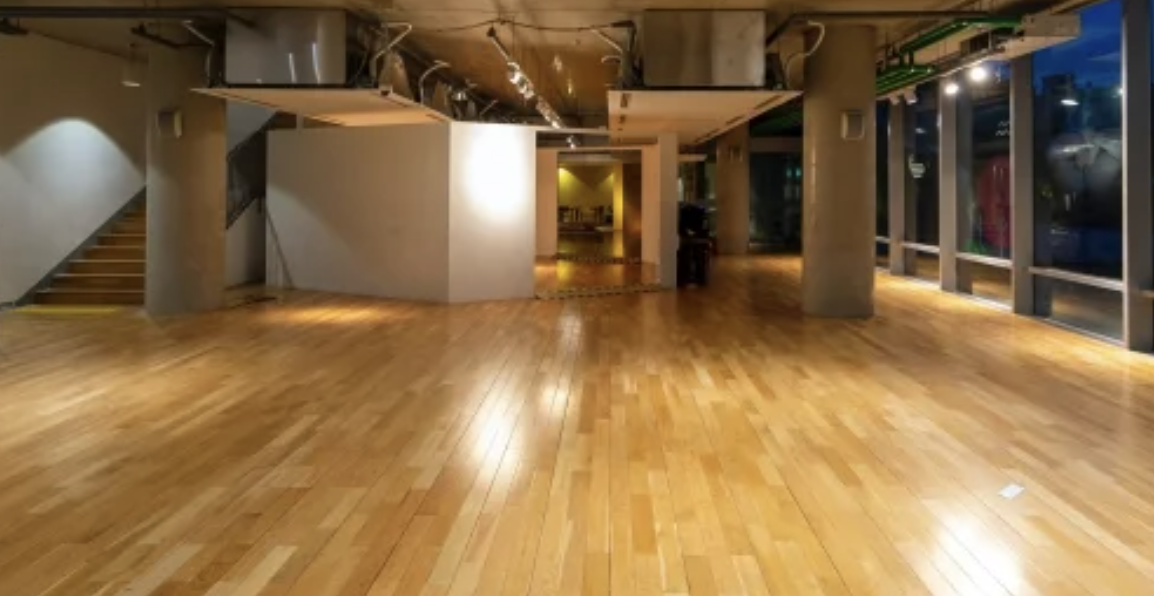 Durable and affordable floor solution featured with family playing on kitchen floor